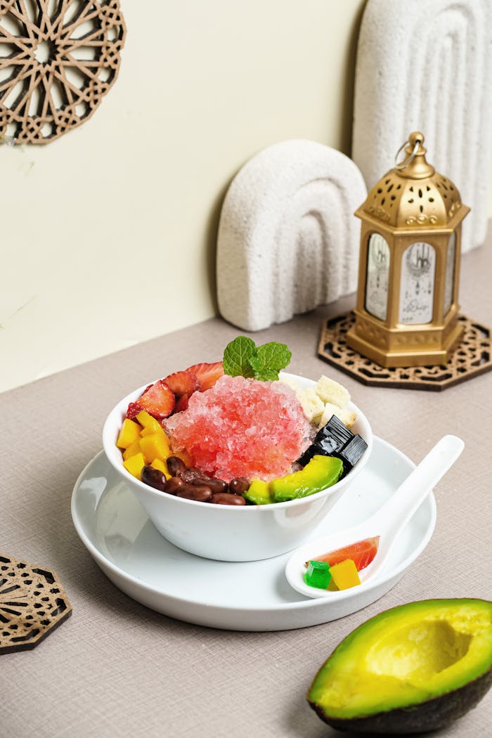 about-01 Delicious Indonesian mixed ice dessert featuring avocado and assorted toppings in a modern setting.